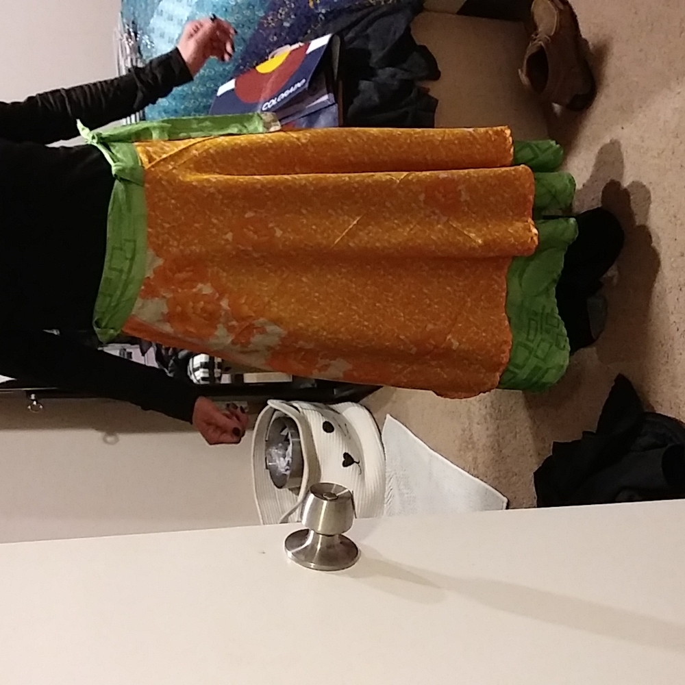 100% Silk reversible wrap skirt from Nepal. Green/orange
